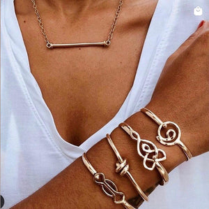 14k yellow gold double love cuff.