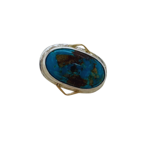 Persian Turquoise ring set in sterling silver with small 14K yellow gold accents.