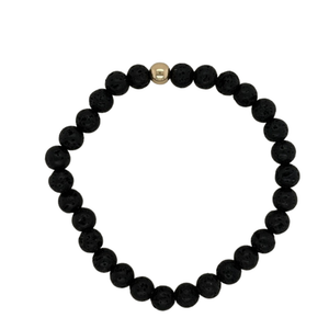 Black Lava hand beaded bracelet with gold fill beads.