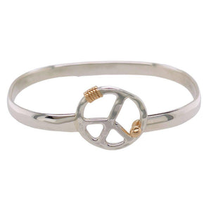Sterling silver & 14k yellow gold peace bracelet.