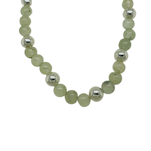Prehnite hand beaded necklace with (8) silver beads.