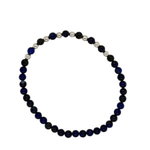Lapis hand beaded bracelet with silver bead accents.