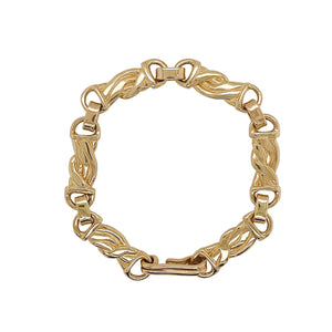 Large link bracelet in gold.