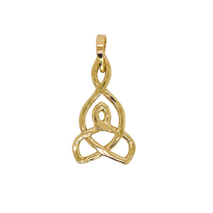 Intricate pendant in gold.