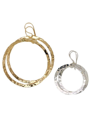 Circle of life earrings in sterling silver and 14 kt gold.