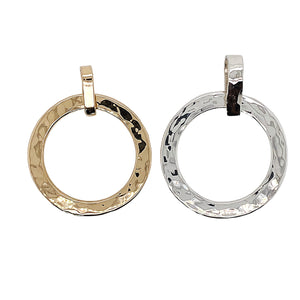 Circle of life pendant in 14 kt gold and sterling silver.