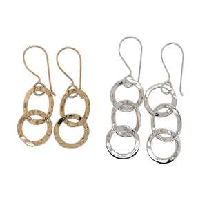 Oval earrings in 14 kt gold and sterling silver.