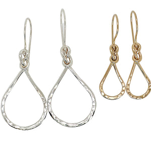 Infinity knot earrings in sterling silver and gold.