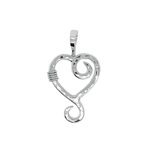  Hammered heart pendant in sterling silver.