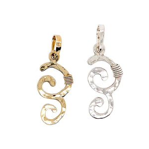 Wave pendant in gold and sterling silver.