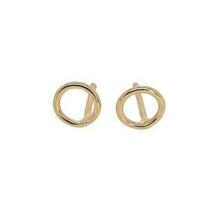 Geometric stud earrings in gold.