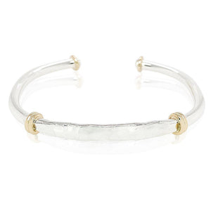Caribbean-made hammered bridge cuff bracelet in sterling silver and sterling silver with gold accents.