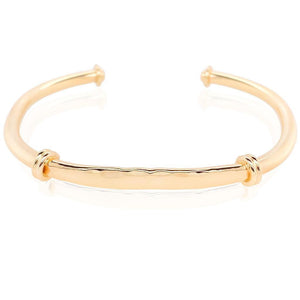 Caribbean hammered bridge cuff bracelet in 14 kt gold.