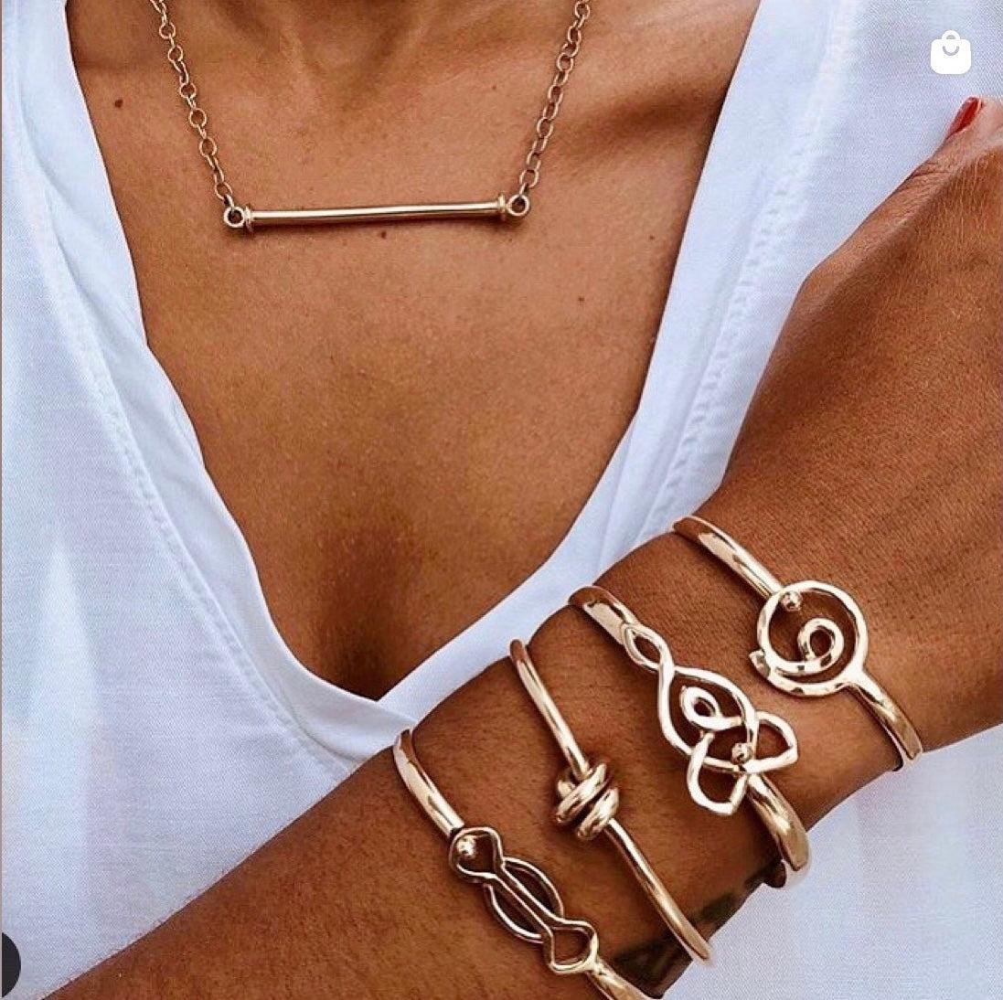 14k yellow gold double love cuff.