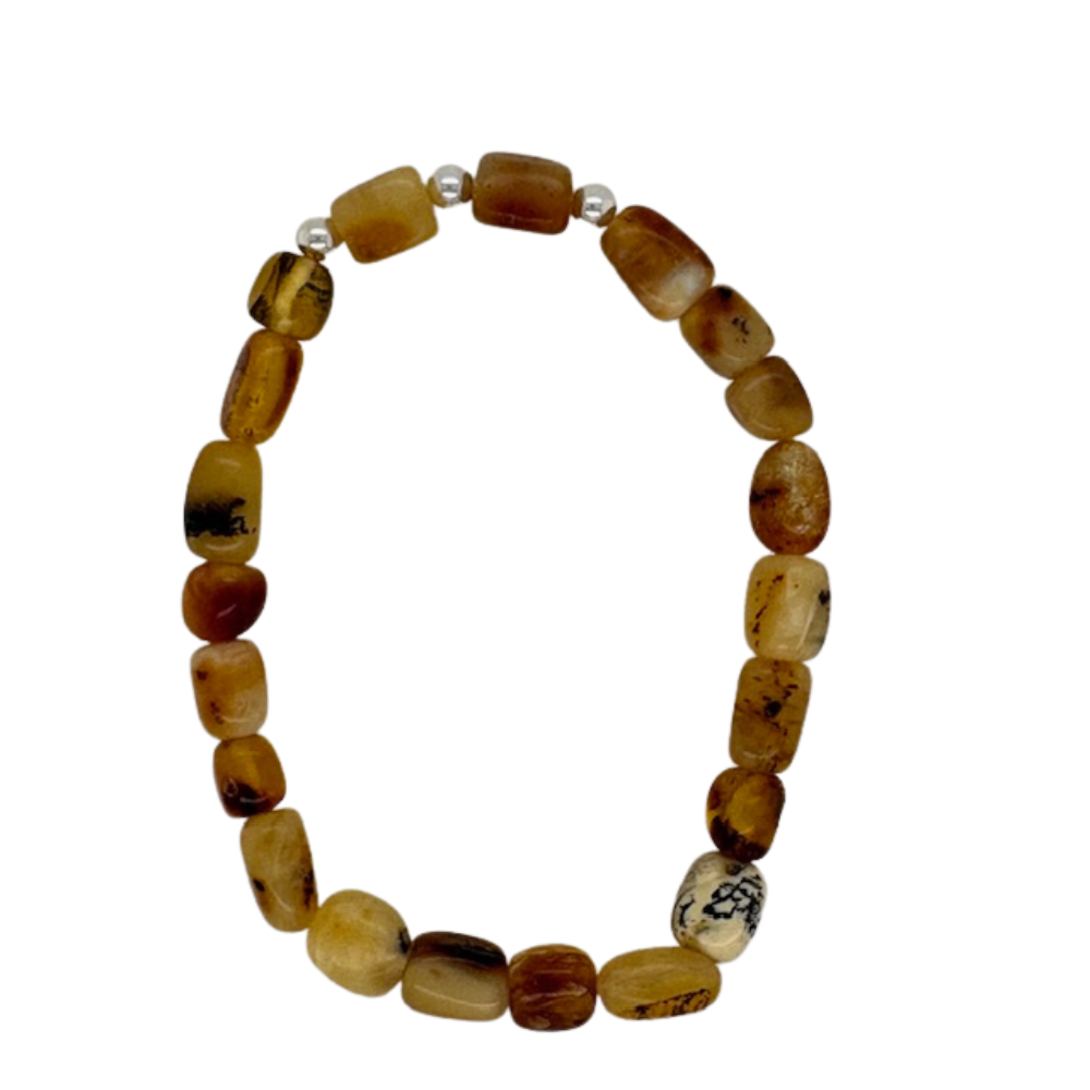 Amber hand beaded bracelet with silver balls.