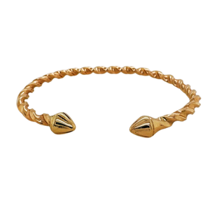 A 14k  gold twisted open cuff bracelet with conical ends, shown on a plain white background.