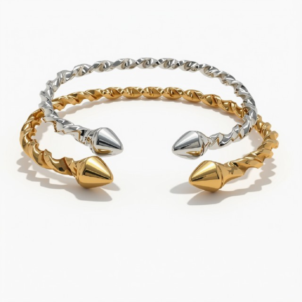 Twisted open cuff bracelet featuring textured gold and silver metal bands with polished conical end caps, shown on a plain white background.