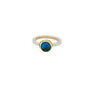  Persian Turquoise ring set in sterling silver w/ an 18K yellow gold bezel.
