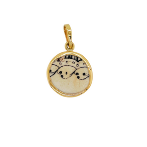 14k yellow gold black double-sided Chaney pendant.