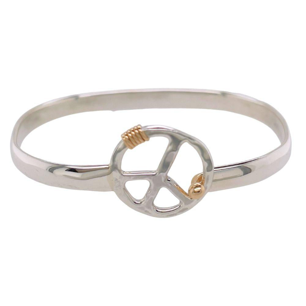 Sterling silver & 14k yellow gold peace bracelet.