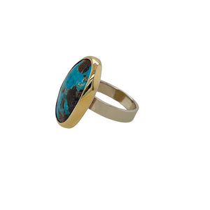 Persian Turquoise ring with an 18K yellow gold bezel and 14K white gold band.