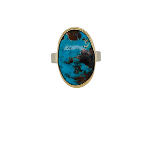 Persian Turquoise ring with an 18K yellow gold bezel and 14K white gold band.