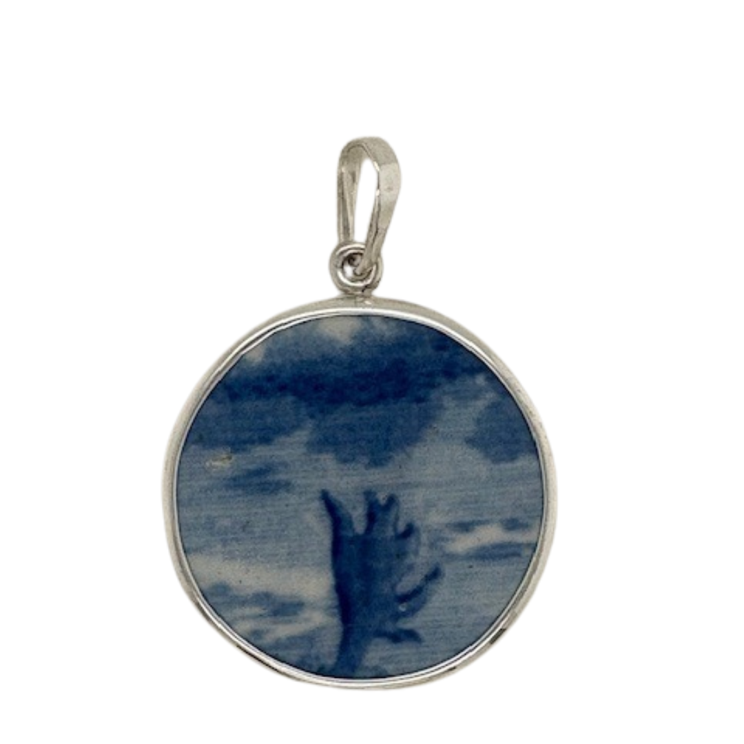 Sterling silver blue Chaney pendant.