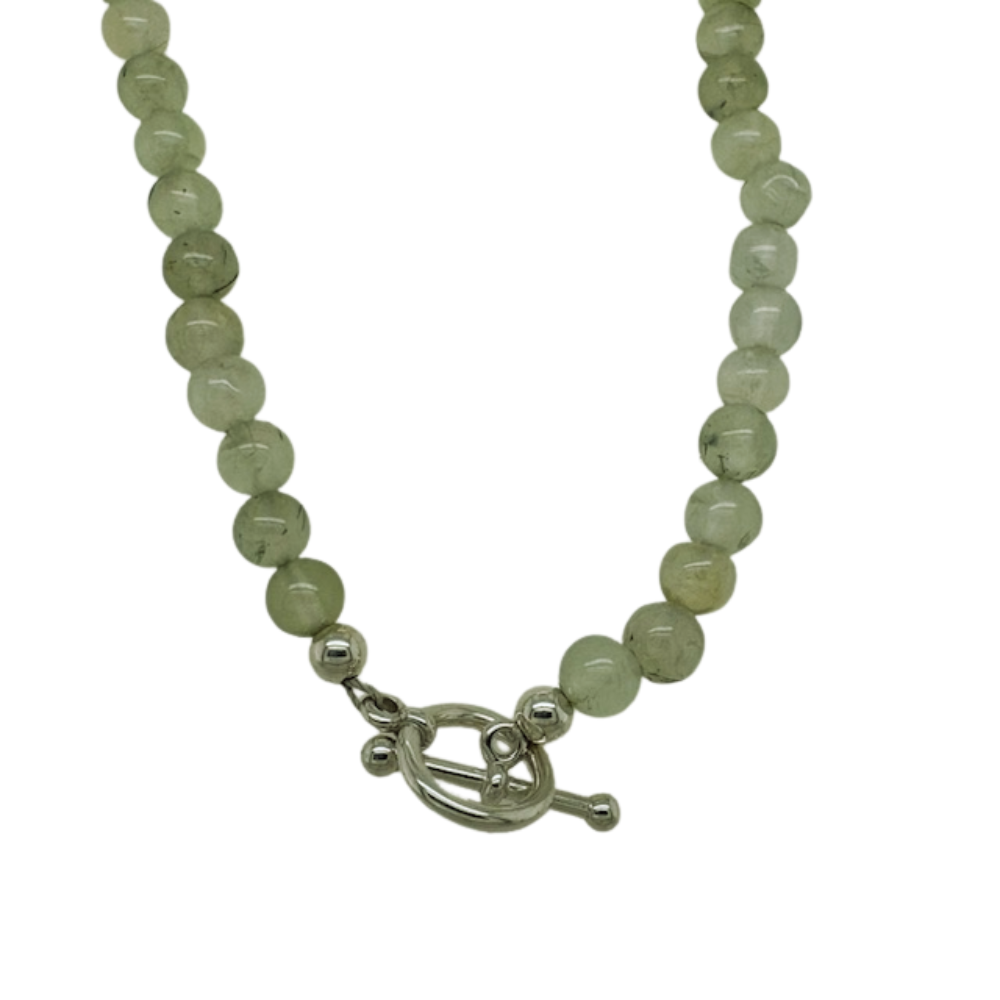 Prehnite hand beaded necklace with (8) silver beads.