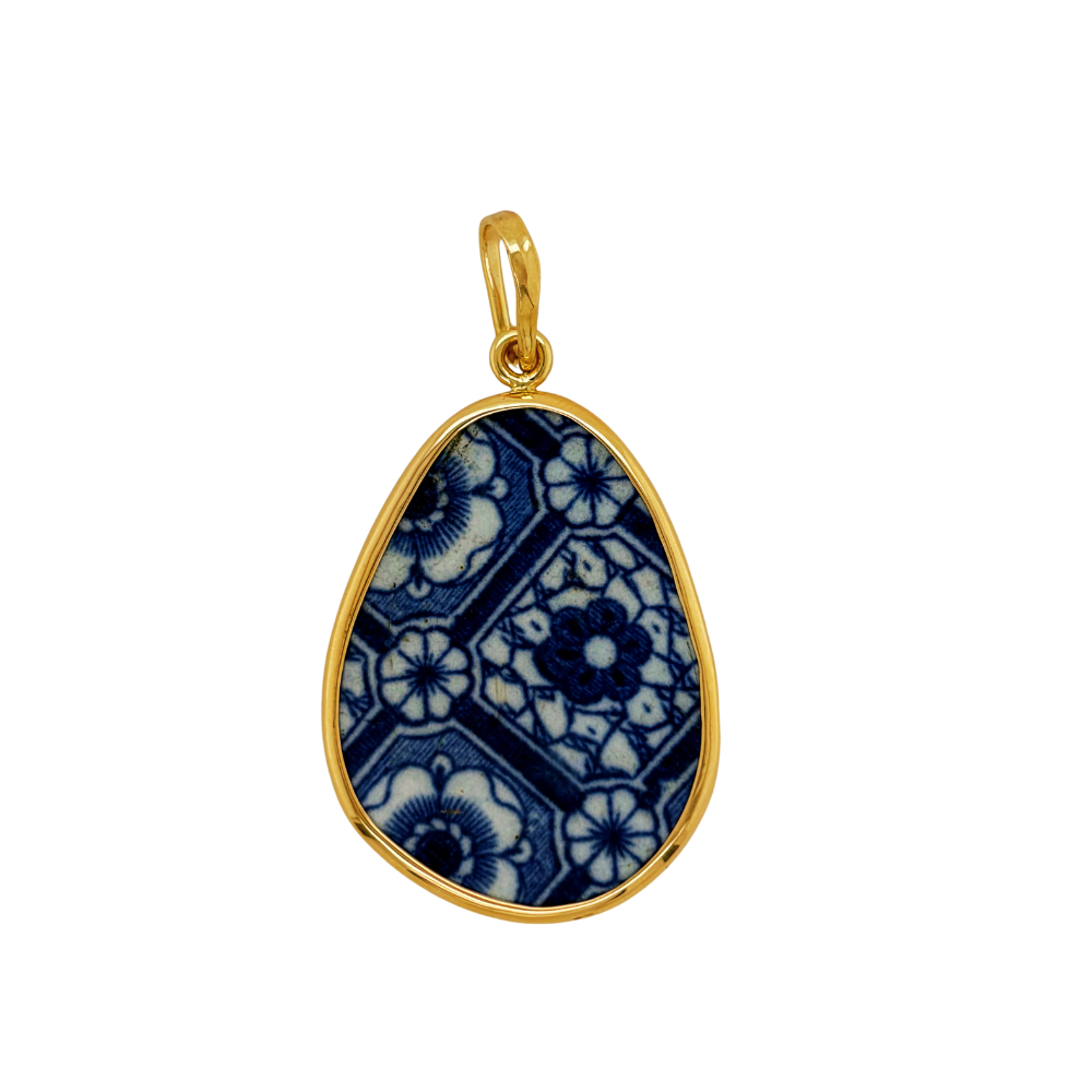 14K yellow gold blue Chaney pendant.