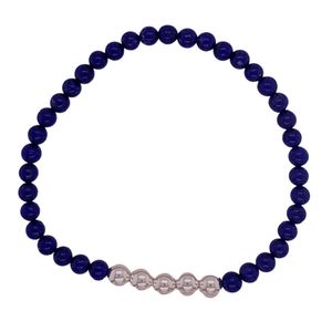 Lapiz hand beaded bracelet with 5 silver balls in a row.