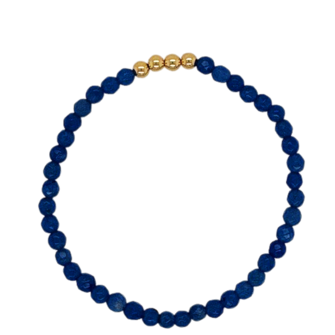 Midnight blue hand beaded bracelet with (4) gold fill beads.