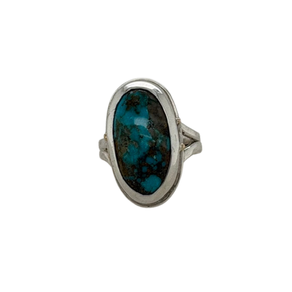 Persian Turquoise ring set in sterling silver with small 14K yellow gold accents.