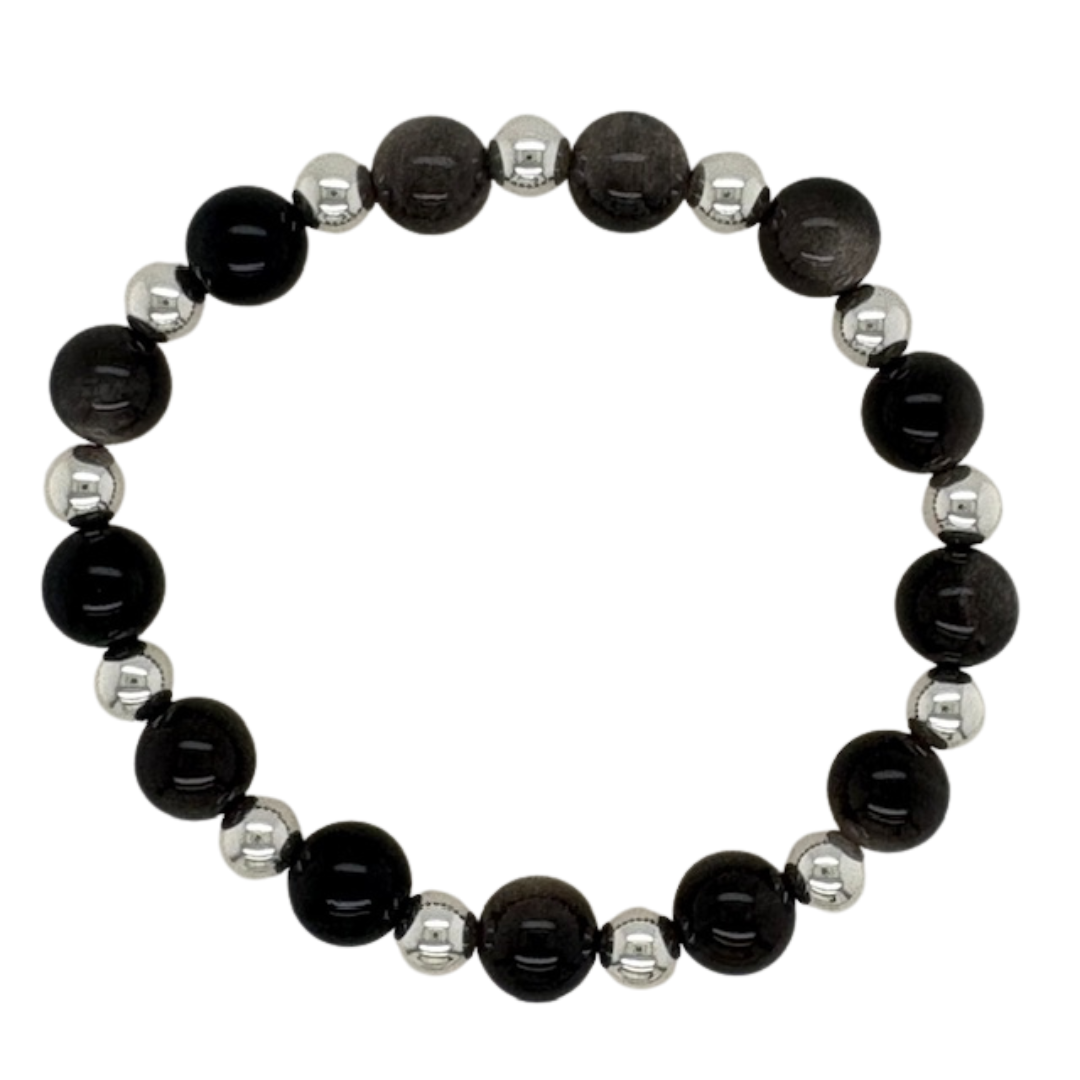 Obsidian hand beaded with alternating silver beads.