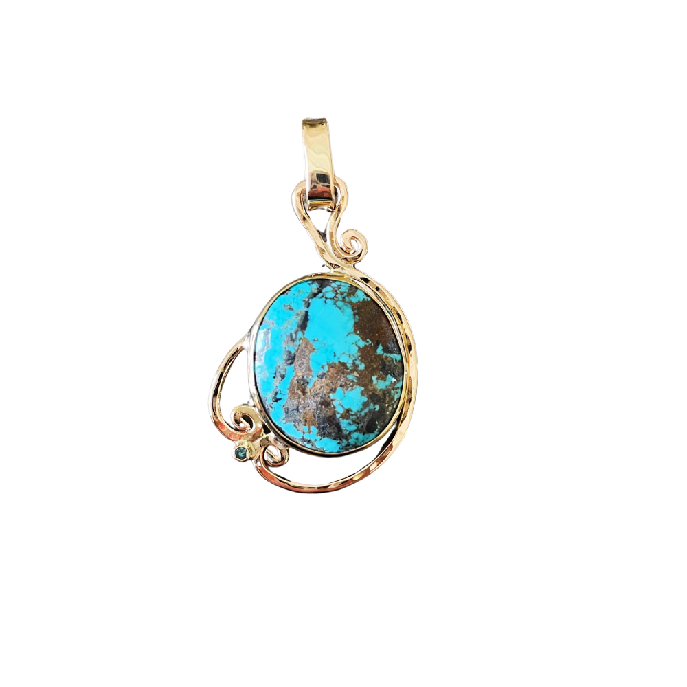 14K yellow gold turquoise pendant with a blue diamond accent.