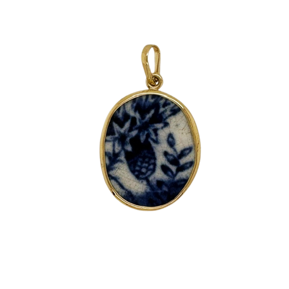 14k yellow gold blue Chaney pendant.