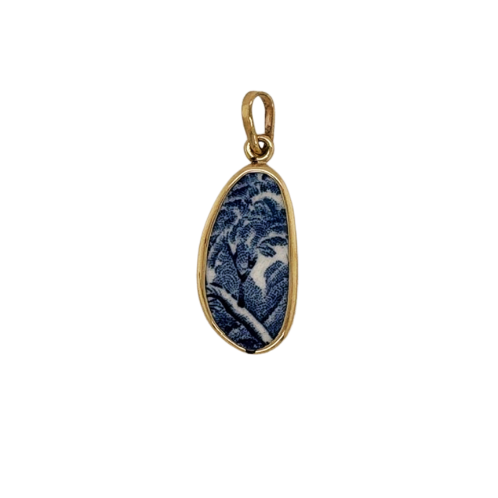 14k yellow gold blue Chaney pendant.