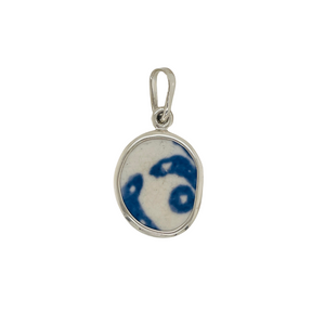 Double sided sterling silver blue Chaney pendant.