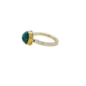 Persian Turquoise ring set in sterling silver w/ an 18K yellow gold bezel.