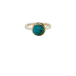 Persian Turquoise ring set in sterling silver w/ an 18K yellow gold bezel.