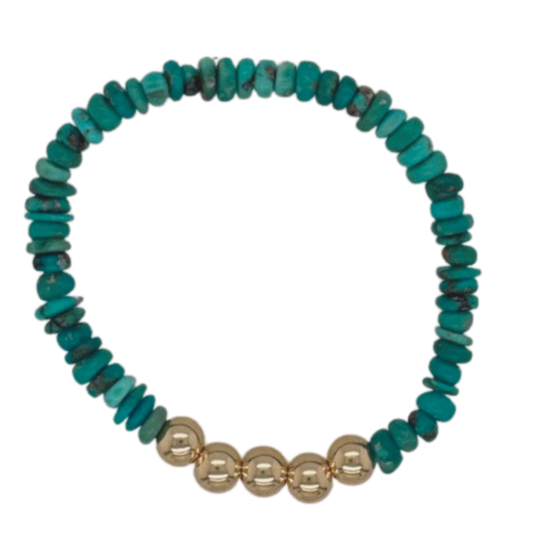 Turquoise 7mm hand beaded bracelet with (5) gold fill ball.