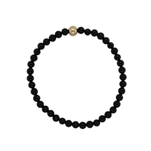 Glossy Onyx hand beaded bracelet with gold fill beads.