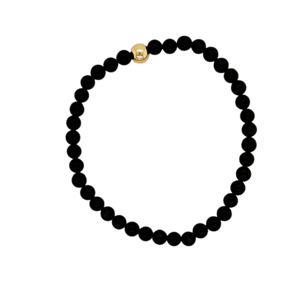 Matte Onyx hand beaded bracelet with gold fill beads.