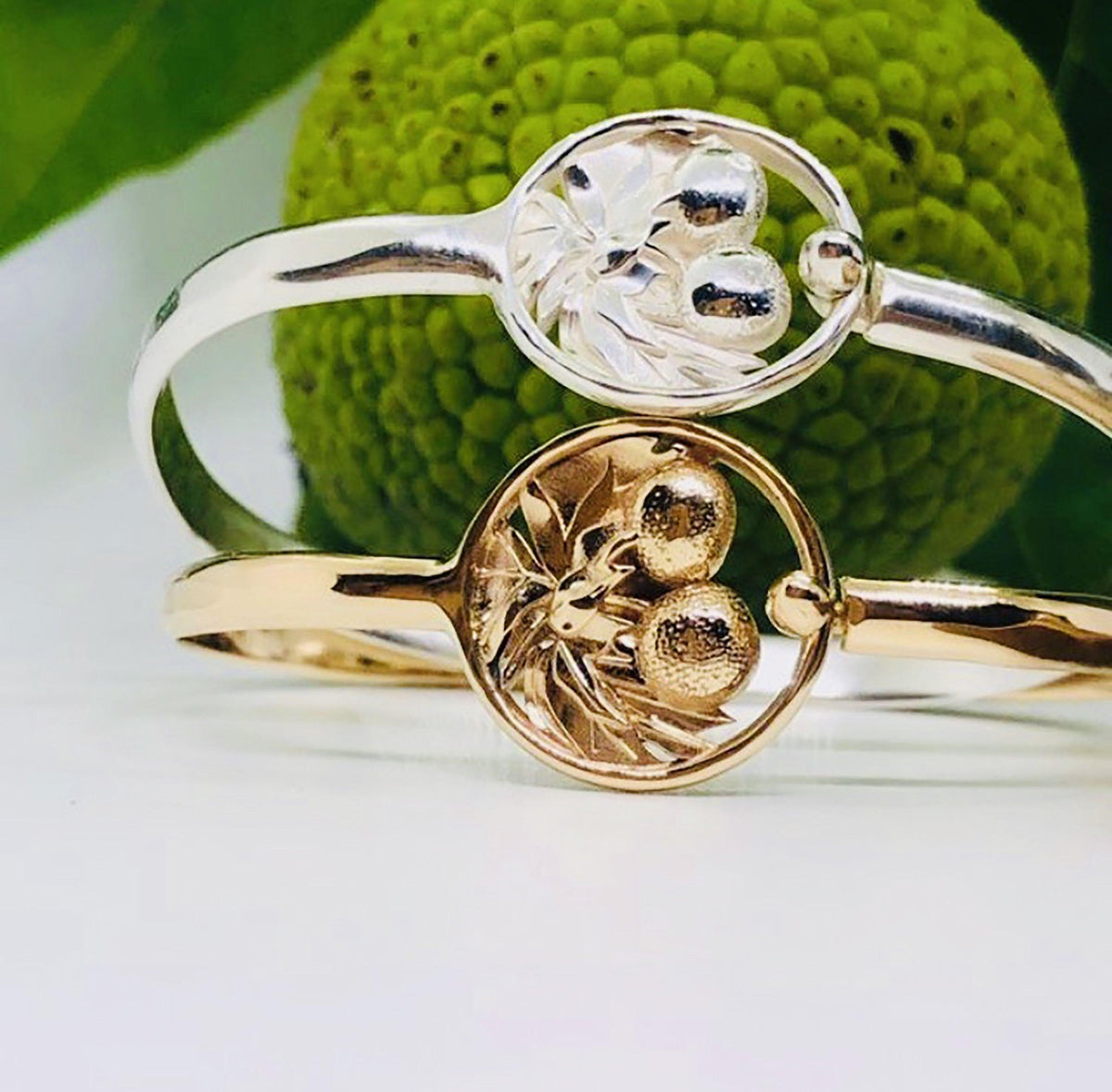 Fruit bracelet in sterling silver and gold.