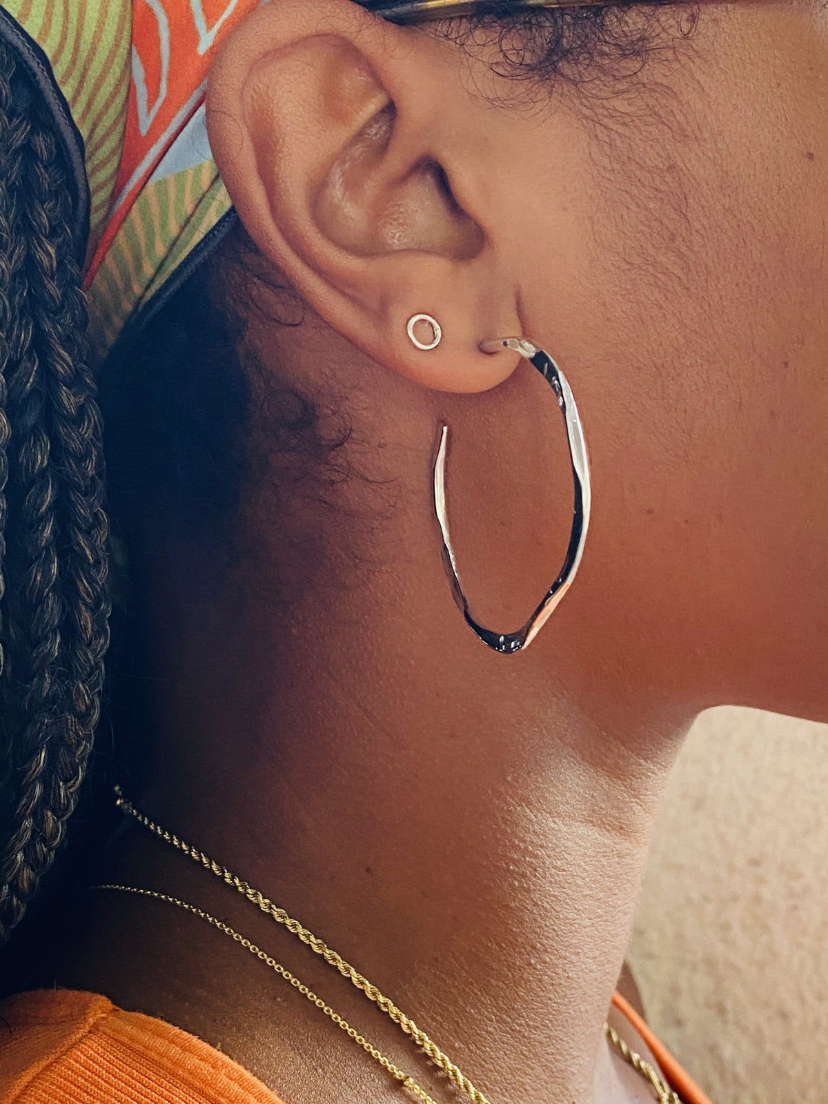 Hammered silver hoop earrings in sterling silver.