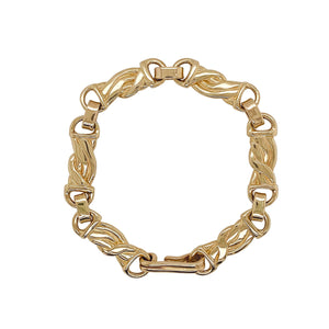 Large link bracelet in gold. 