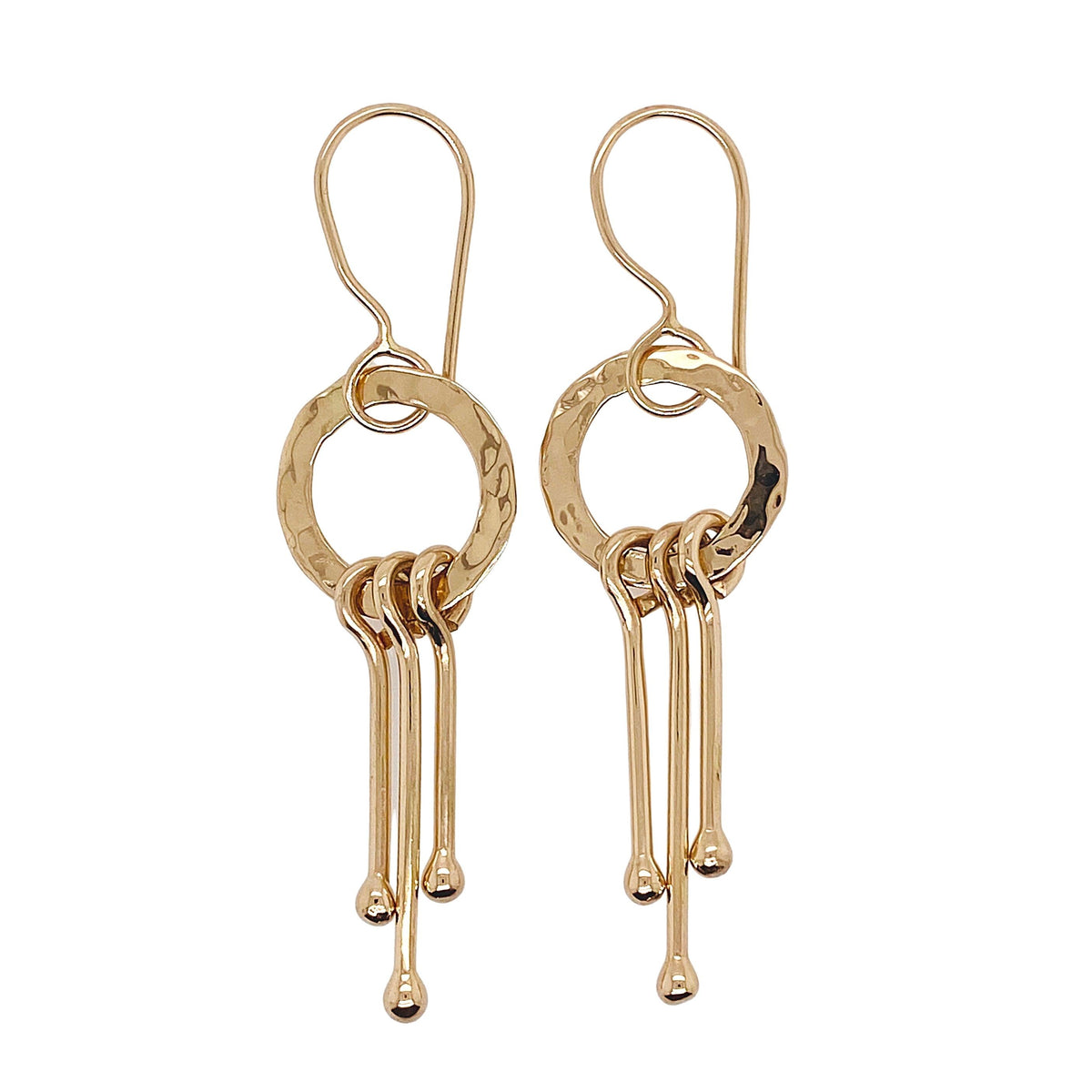 Ball dangle earrings in 14 kt gold. 