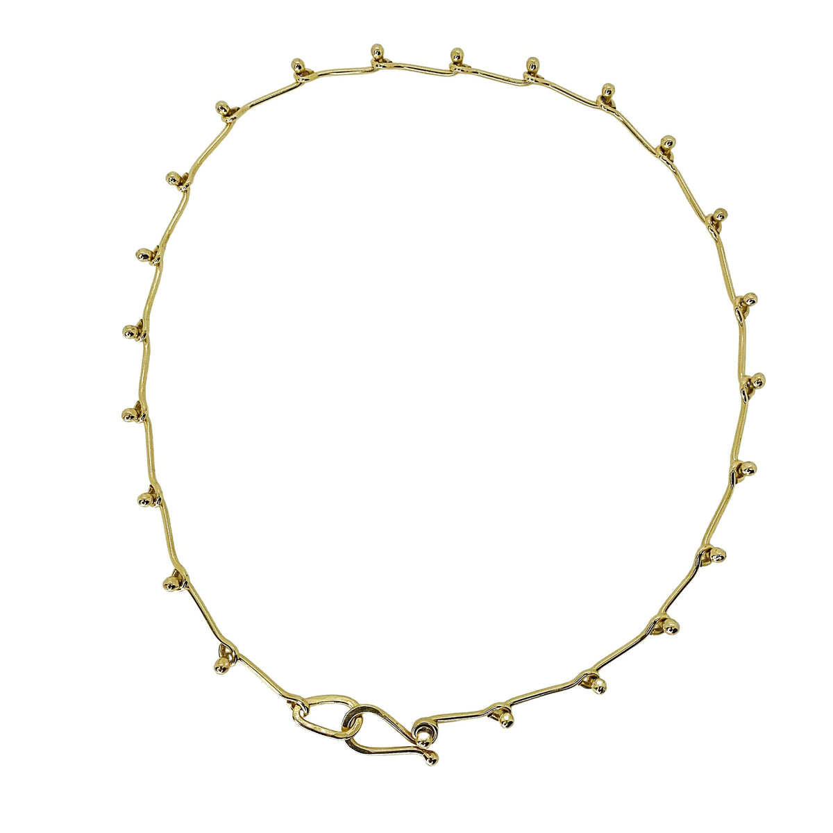Ball link necklace in 14 kt gold.