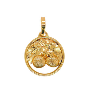 Fruit pendant in gold.