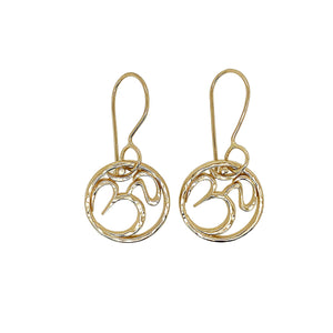 Om earrings in gold.