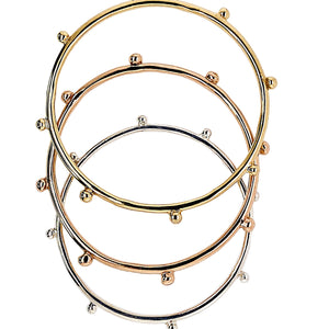 Dreamcatcher bangle in sterling silver, rose gold, and  gold.